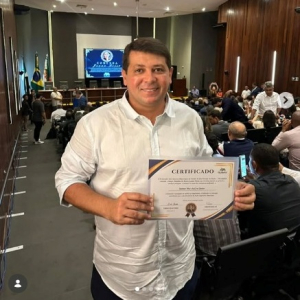 Recebendo a Honraria Joana Bessa concedida pela FECAM/RN.